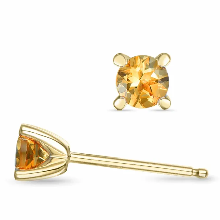 2 x 0,25 ct sitriini solitaire-nappikorvakorut 9 karaatin kultaa kanssa sitriini