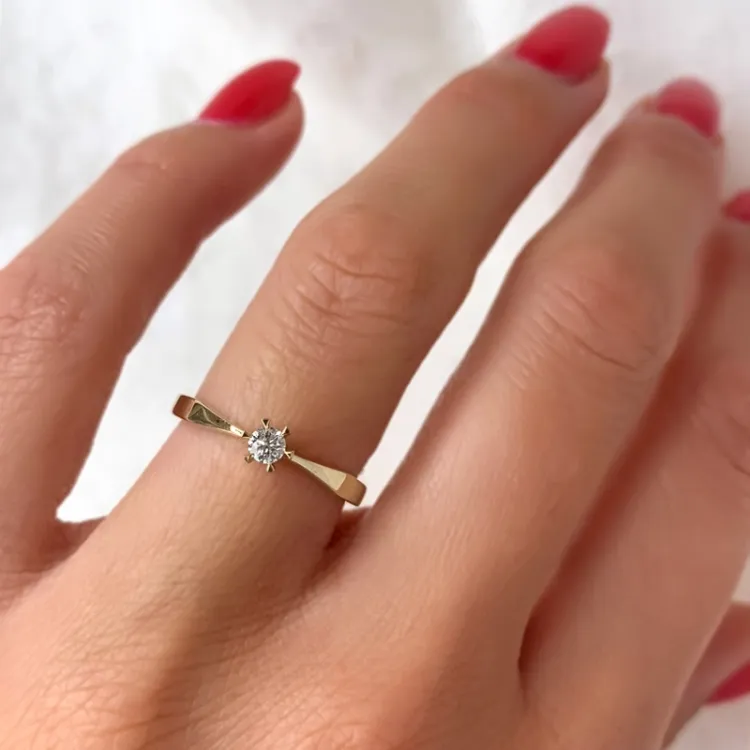 0,10 ct timantti solitaire-sormus 14 karaatin kultaa 0,11 ct