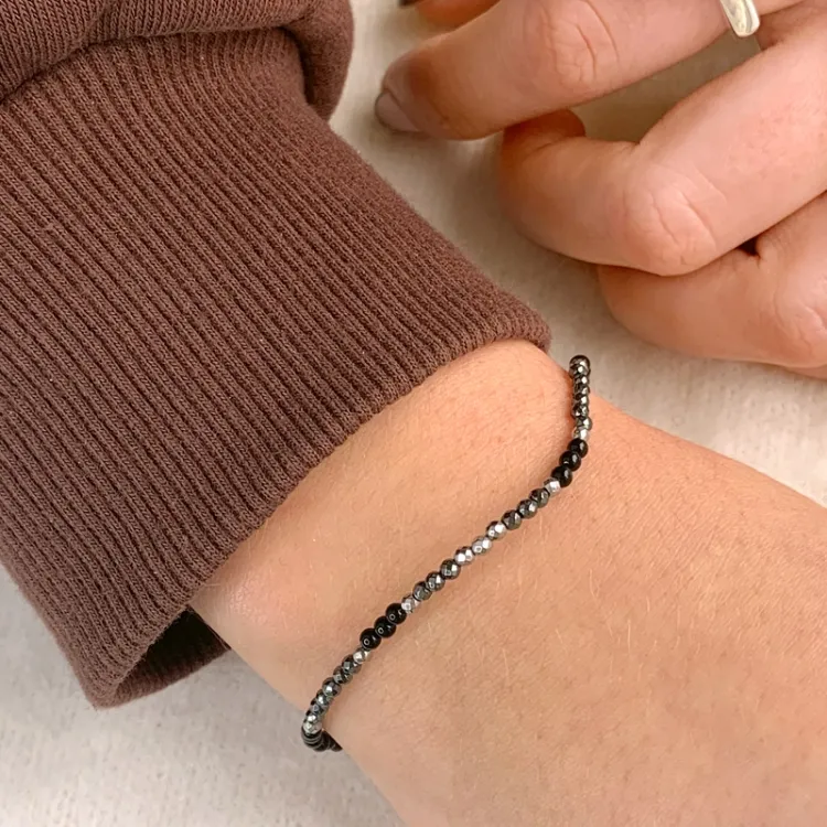 rannekoru  onyx-kiveä ja hematite - Loom Stones