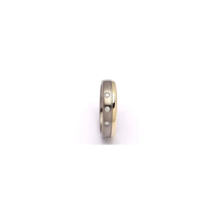 Vihkisormus titaani ja keltakulta 0,06 ct