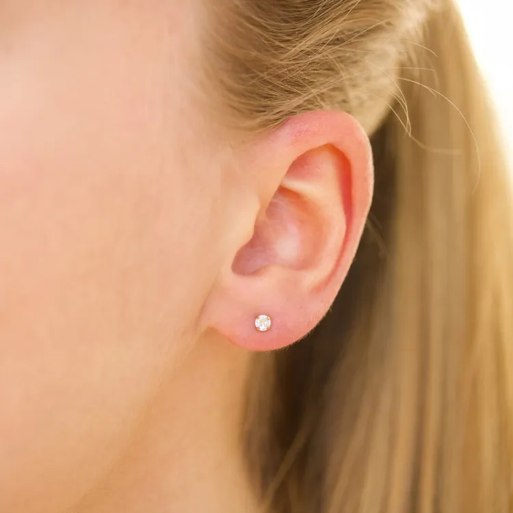 3 mm vedenkestävät zirkoni solitaire-nappikorvakorut  kullattu teräs - OCEANA