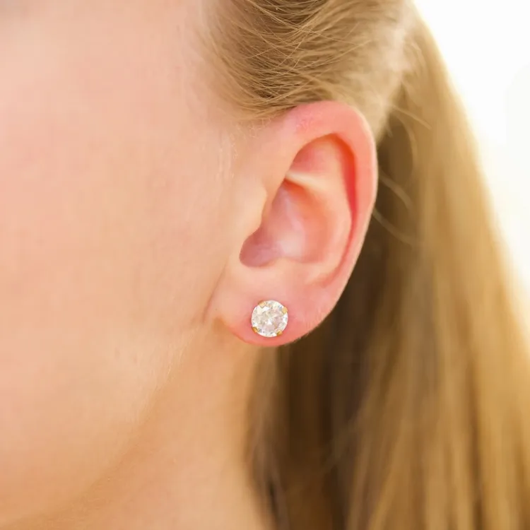 7 mm vedenkestävät solitaire-nappikorvakorut  kullattu teräs - OCEANA