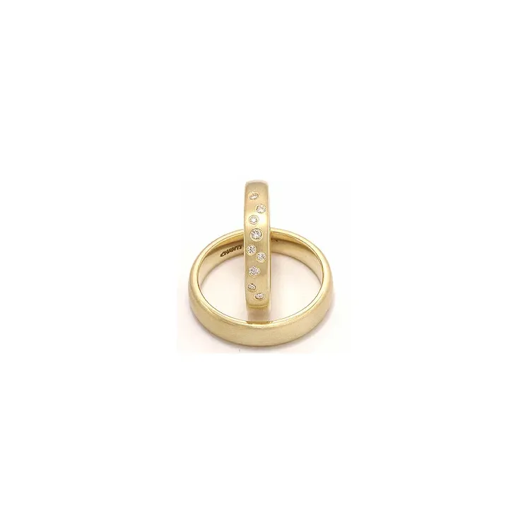 Vihkisormusta 14 karaatin kultaa 0,126 ct - setit