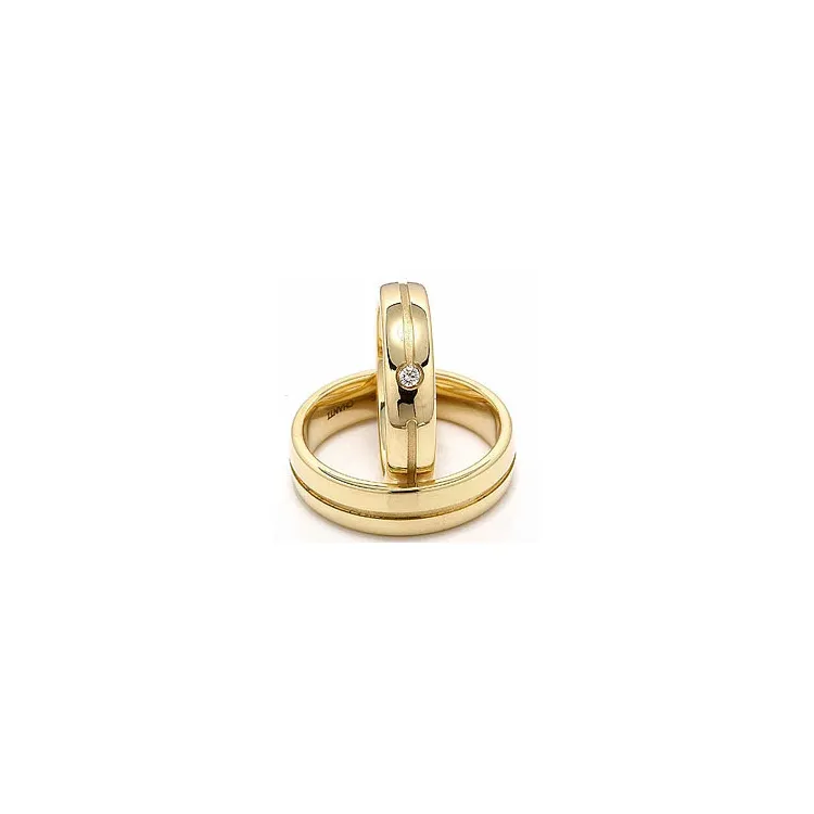 Vihkisormusta 14 karaatin kultaa 0,04 ct - setit