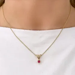 aitoja rubiini riipus 14 karaatti kultaa 0,30 ct