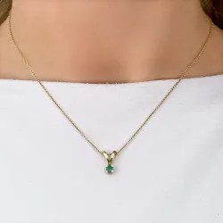 vihreä smaragdi riipus 14 karaatti kultaa 0,22 ct