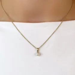 5 mm norsunluu valkoinen helmi riipus  9 karaatin kultaa