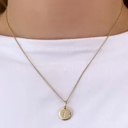 T-kirjain timantti riipus 9 karaatti kultaa 0,01 ct