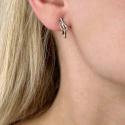 timanttikorvakorut 9 karaatin kultaa ja valkokult kanssa timantti 