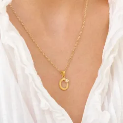 o-kirjain riipus  kullattua hopeaa