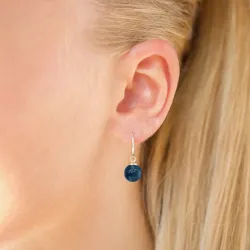 korvarenkaat 9 karaatin kultaa kanssa tummansininen kristalli