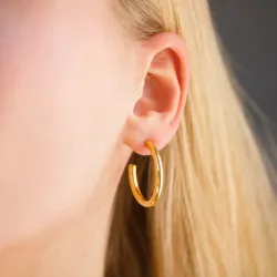 27 mm vedenkestävät rengaskorvakorut  kullattu teräs - OCEANA