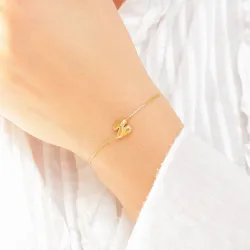 vedenkestävät n-kirjain rannekoru kullattu teräs - OCEANA