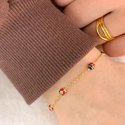 leppäkerttu rannekoru kullattua hopeaa riipus kullattua hopeaa