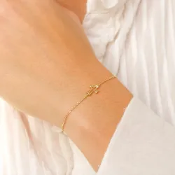 risti rannekoru kullattua hopeaa