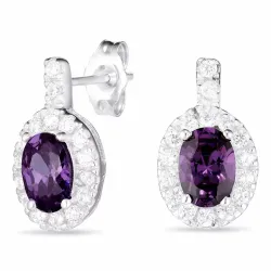 näytepakkaukset lila korvarenkaat  hopeaa